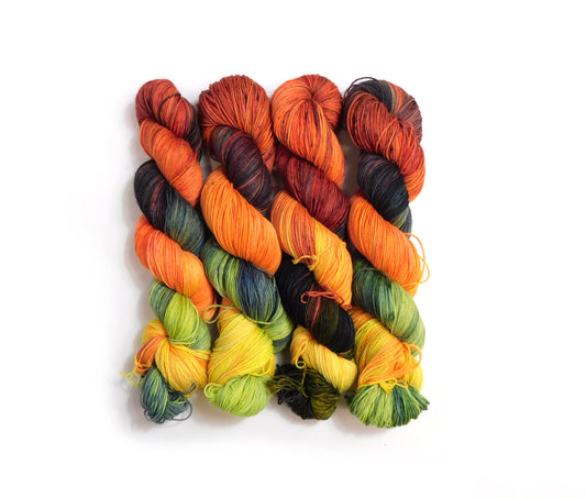 RAMMSKEINS: Till 100g Variegated Yellow Orange Black Sock Yarn Fluorescent/UV Reactive